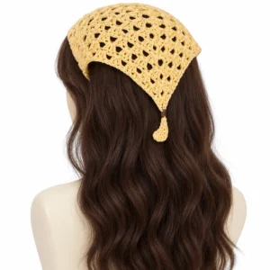 Butter-yellow crochet hair bandana worn over a long brown wig on a mannequin, viewed from the back